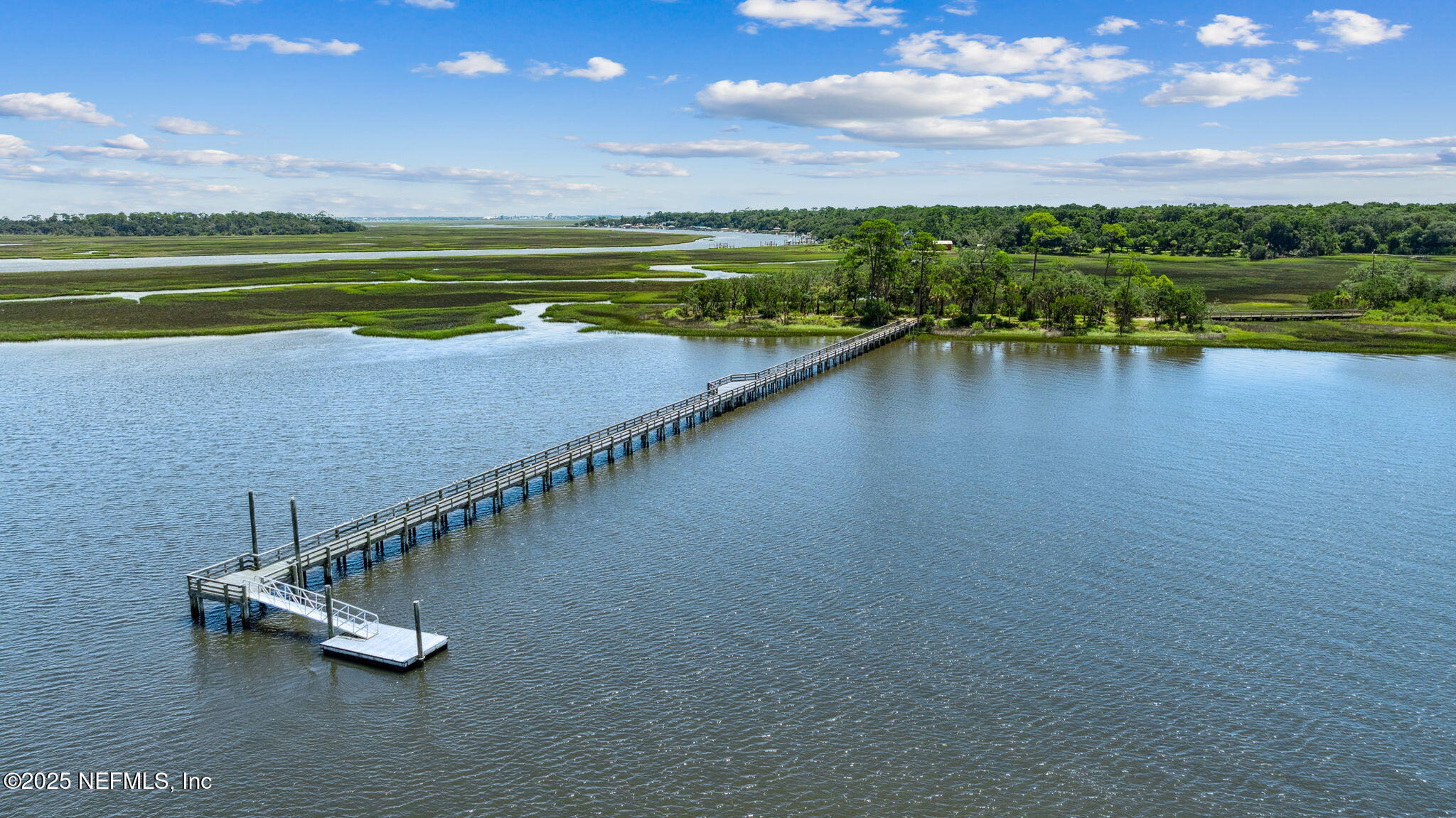 28886 Grandview Manor Yulee, FL 32097 - Photo 32 of 35 a view of swimming pool with a yard and outdoor seating