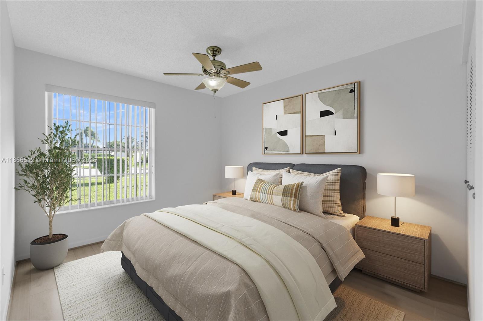 13440 Southwest 81st Street Miami, FL 33183 - Photo 15 of 23 a bedroom with a bed and a window
