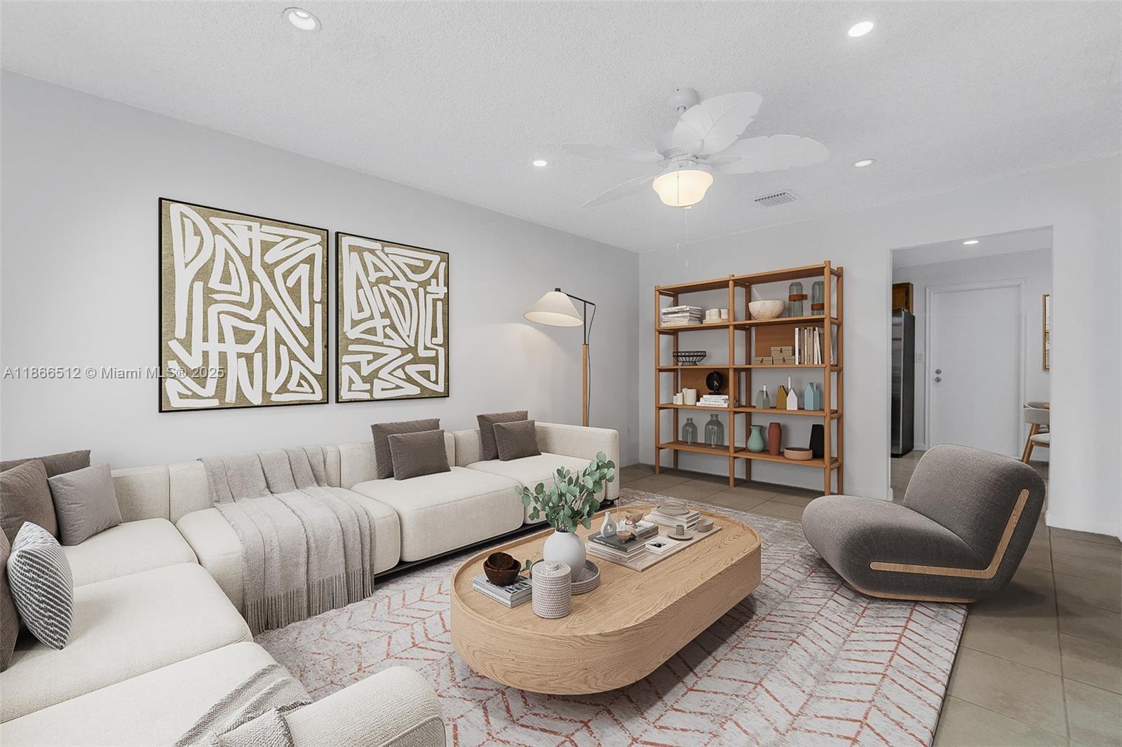 13440 Southwest 81st Street Miami, FL 33183 - Photo 6 of 23 a living room with furniture and a hard wood floor
