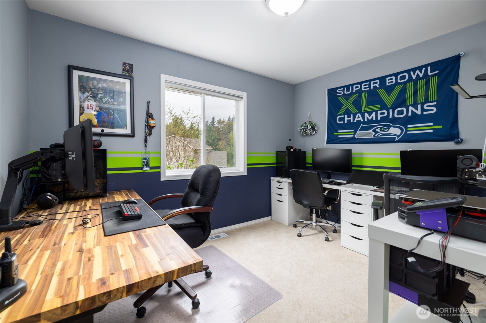1014 South 38th Place Mount Vernon, WA 98274 - Photo 16 of 39 a view of a workspace with furniture and a window