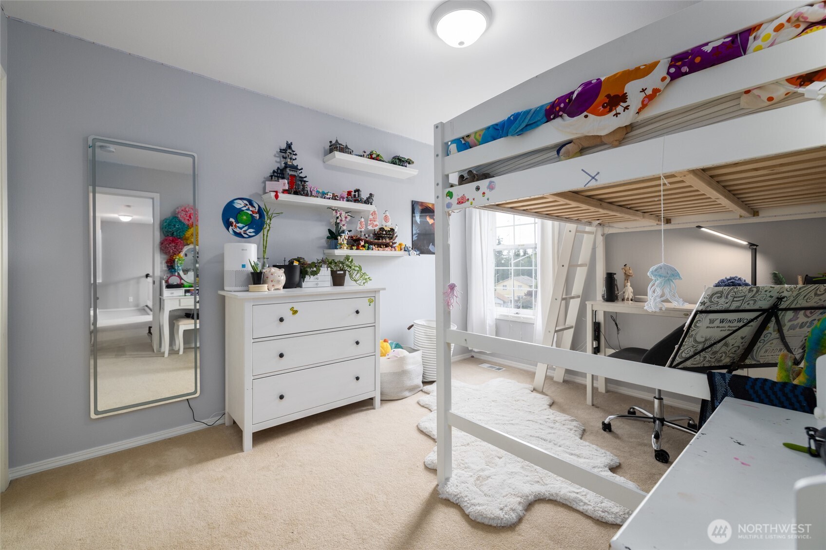 1014 South 38th Place Mount Vernon, WA 98274 - Photo 21 of 39 a room with furniture and a wooden floor