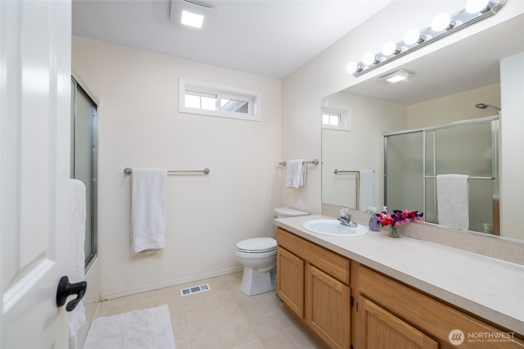1014 South 38th Place Mount Vernon, WA 98274 - Photo 23 of 39 a bathroom with a double vanity sink mirror and toilet
