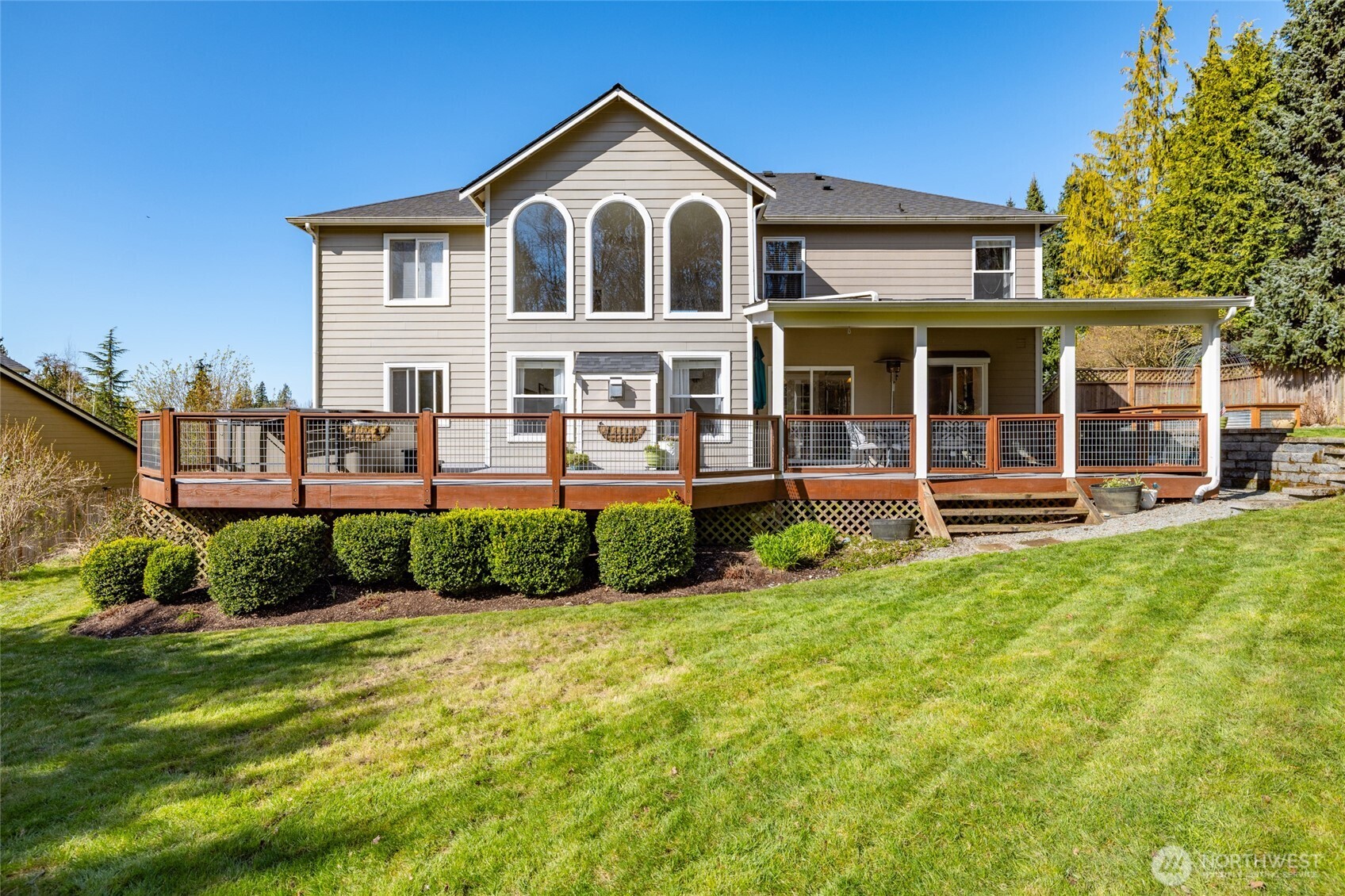 1014 South 38th Place Mount Vernon, WA 98274 - Photo 30 of 39 a front view of a house with a yard