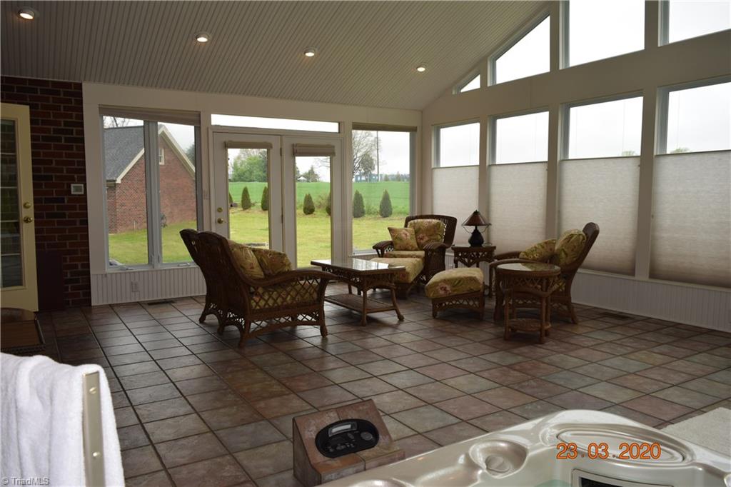 3003 Sides Road Rockwell, NC 28138 - Photo 26 of 30 Window shades in the sun room allows you private space to enjoy.