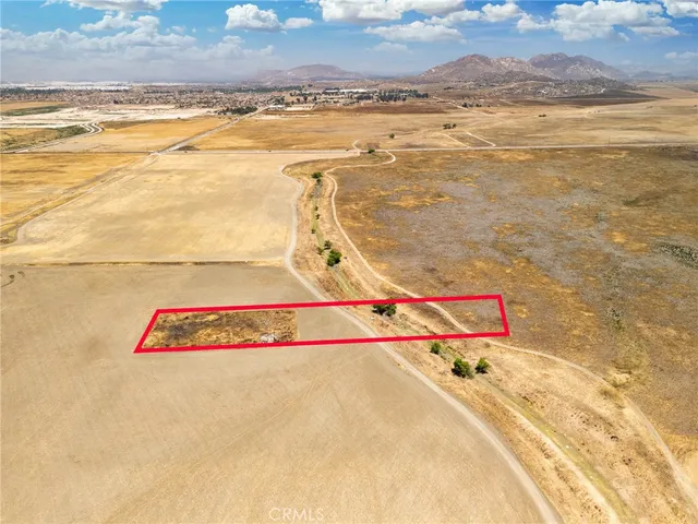 a picture of an ocean with a mountain