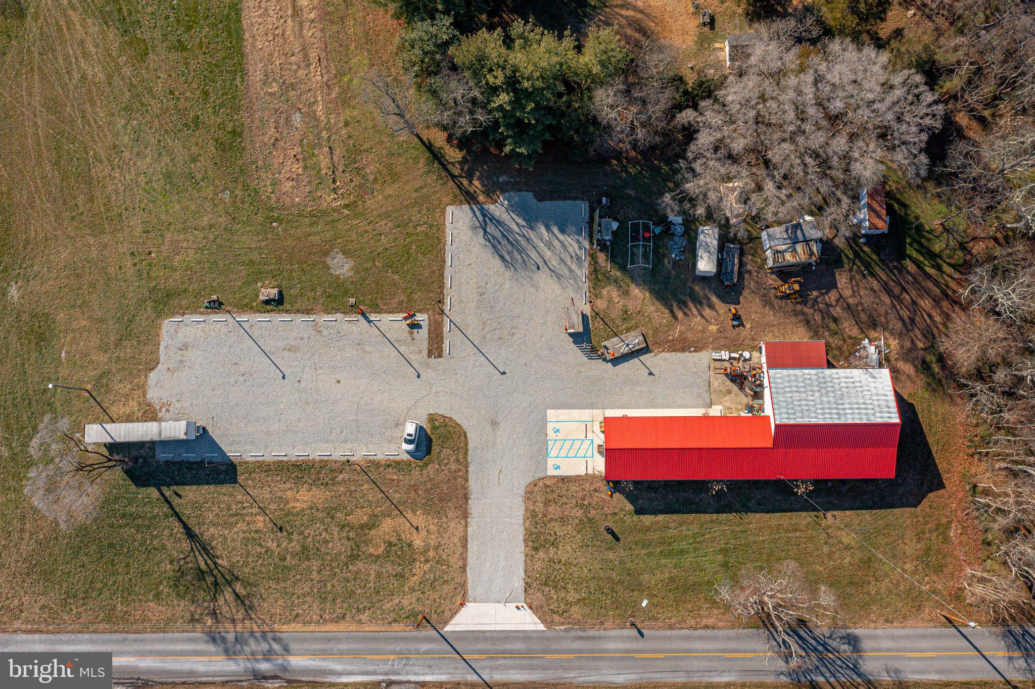 an aerial view of a houses with yard