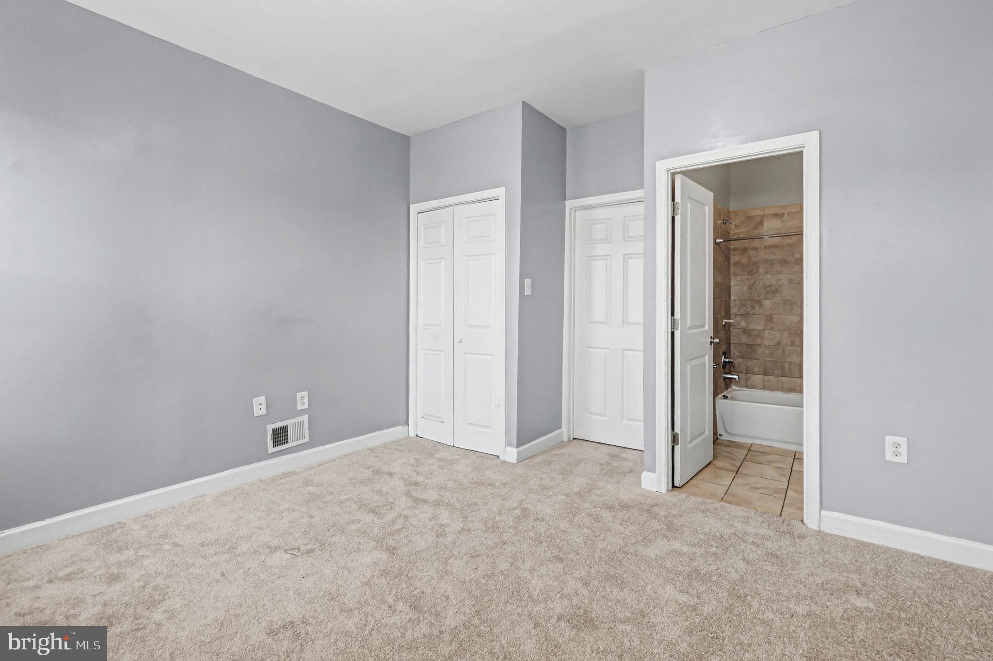 407 West 28th Street Baltimore, MD 21211 - Photo 18 of 30 wooden floor and closet in a room