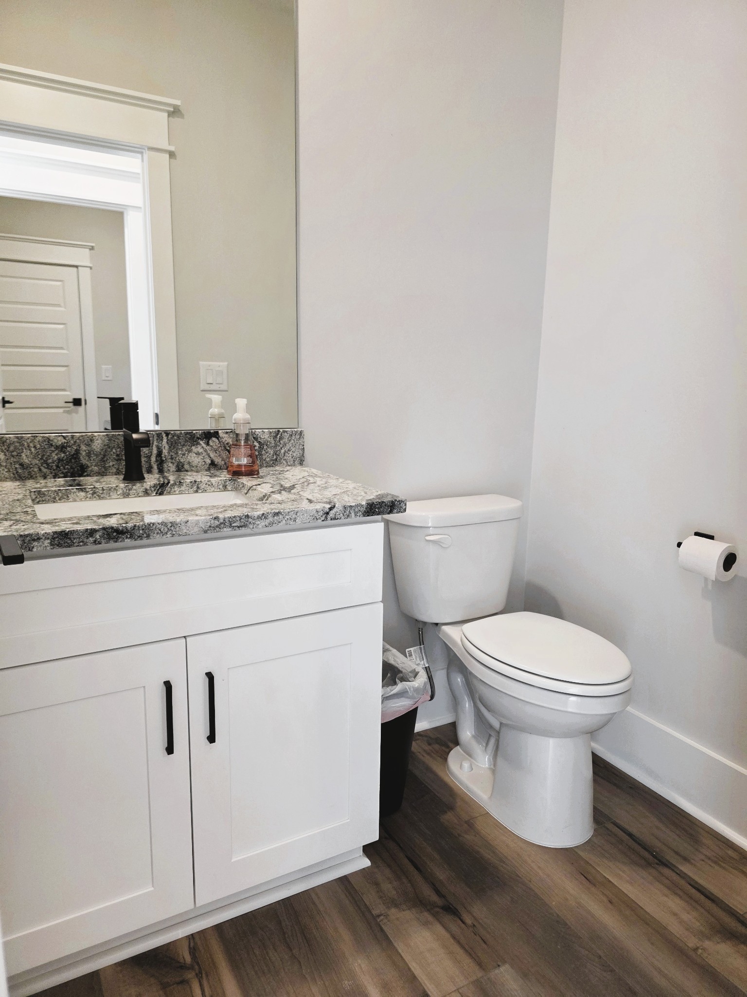 369 Springbrook Boulevard White House, TN 37188 - Photo 13 of 30 a bathroom with a granite countertop toilet sink and mirror