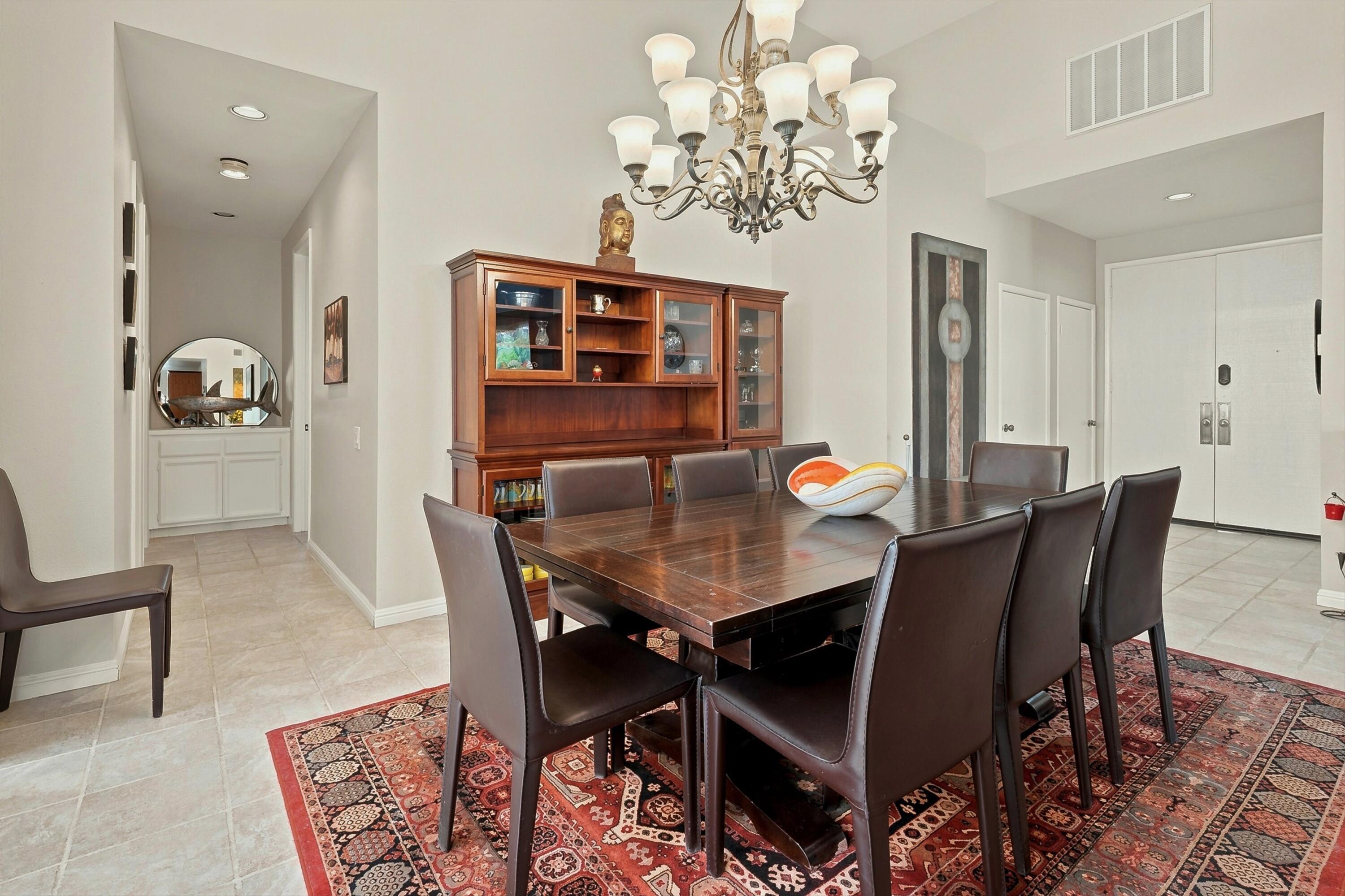 138 Lakeshore Drive Rancho Mirage, CA 92270 - Photo 4 of 30 a view of a dining room with furniture