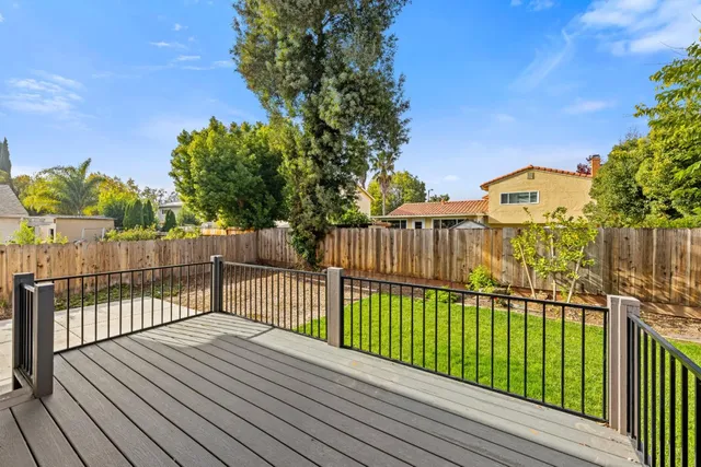 a view of a wooden roof deck