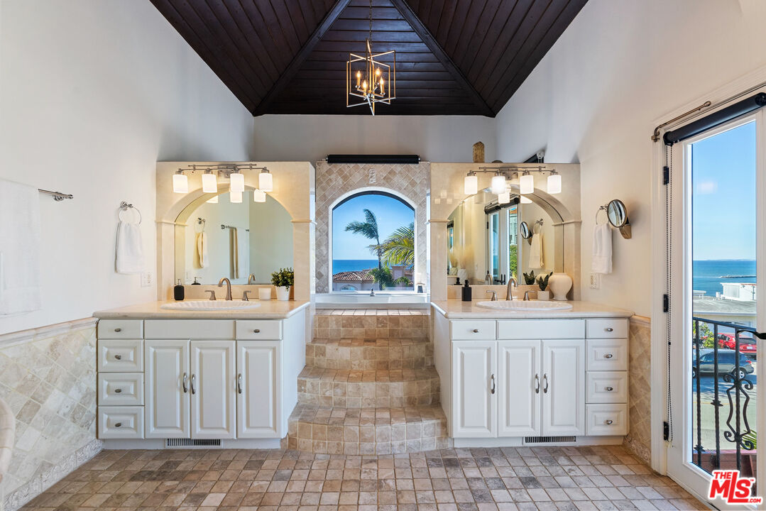 7112 Rindge Avenue Playa del Rey, CA 90293 - Photo 14 of 39 a view of entryway with chandelier fan and wooden floor