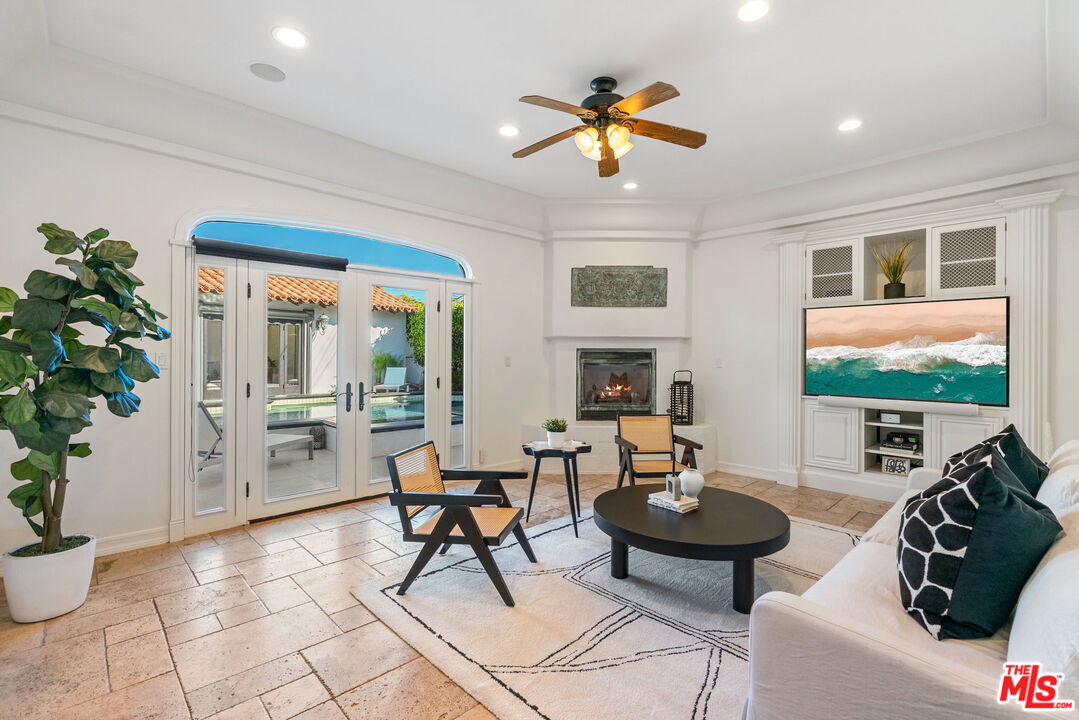 7112 Rindge Avenue Playa del Rey, CA 90293 - Photo 29 of 39 a living room with furniture and a potted plant