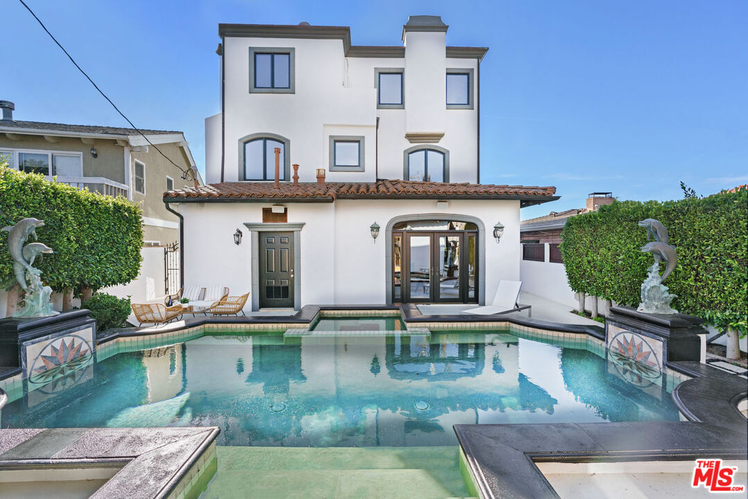 7112 Rindge Avenue Playa del Rey, CA 90293 - Photo 30 of 39 a view of a house with swimming pool