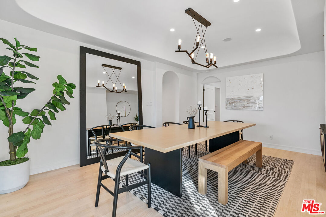7112 Rindge Avenue Playa del Rey, CA 90293 - Photo 5 of 39 a view of a dining room with furniture and wooden floor