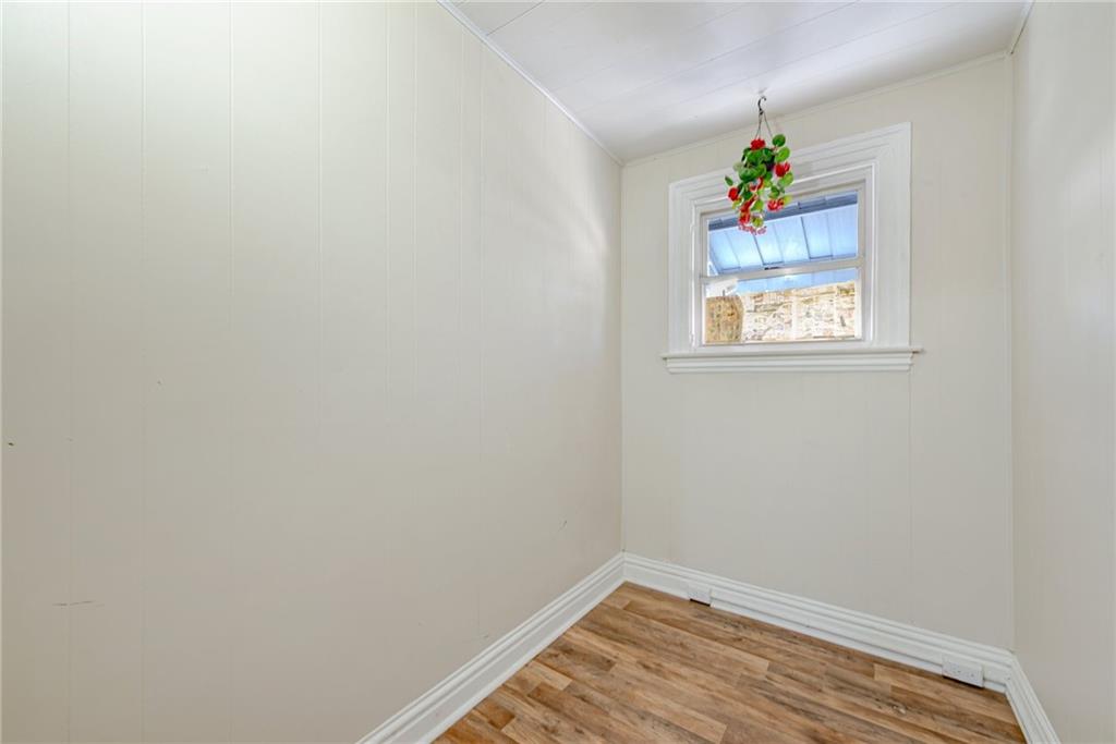 247 Marion Street McKees Rocks, PA 15136 - Photo 13 of 19 a view of an empty room and window