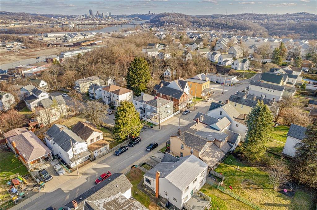 247 Marion Street McKees Rocks, PA 15136 - Photo 16 of 19 an aerial view of residential houses with outdoor space