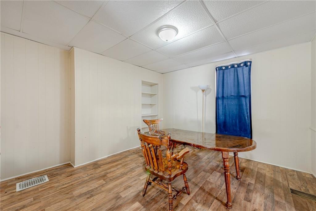 247 Marion Street McKees Rocks, PA 15136 - Photo 7 of 19 a room with furniture and a window