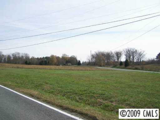 Lot 1 White Store Road Wingate, NC 28174 - Photo 3 of 3 a view of a field of grass and trees