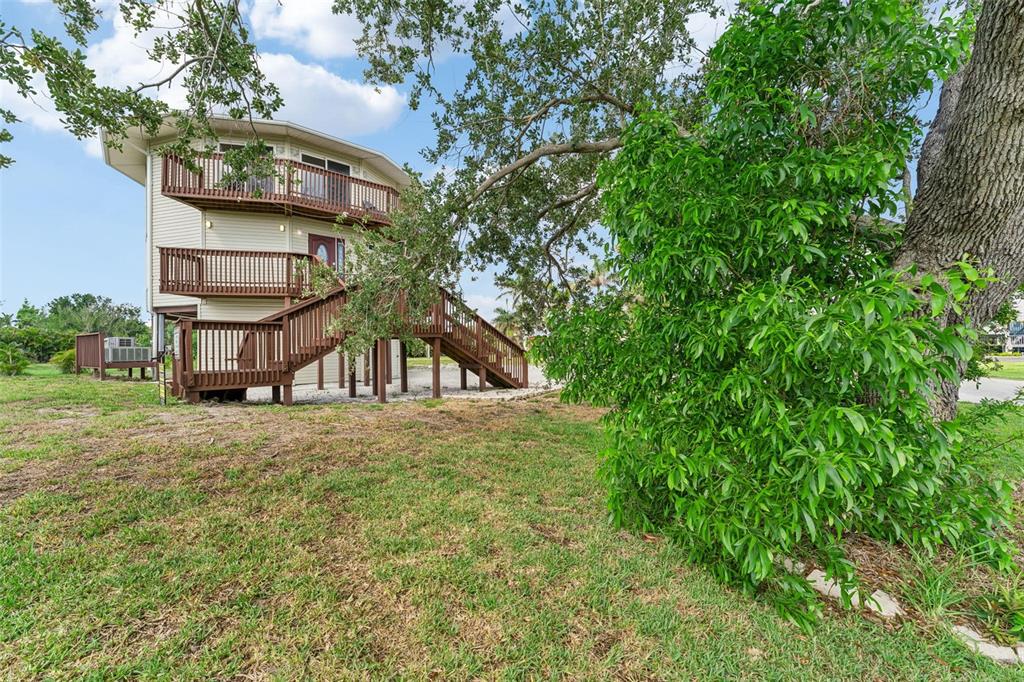 16361 Stringfellow Road Bokeelia, FL 33922 - Photo 3 of 26 a house view with a outdoor space