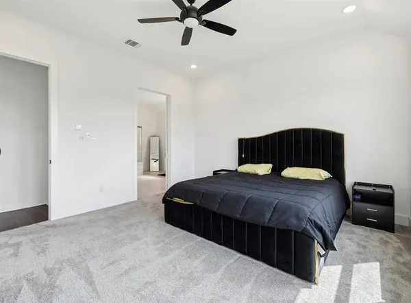 a bedroom with a bed and a closet