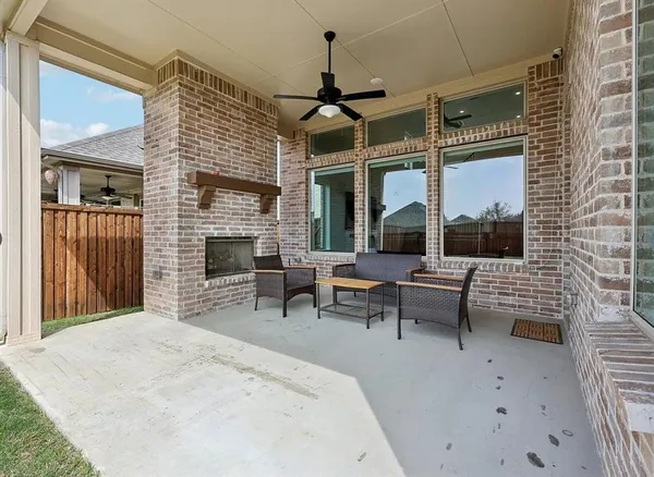 a house view with a backyard space