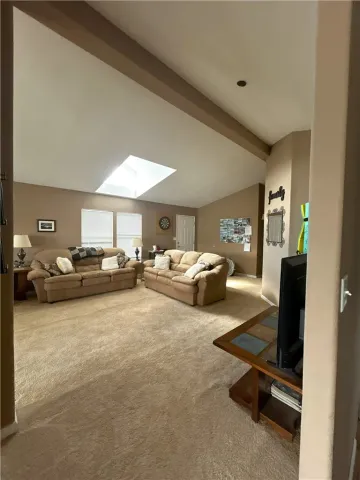 a view of a hallway with bathroom and bathroom