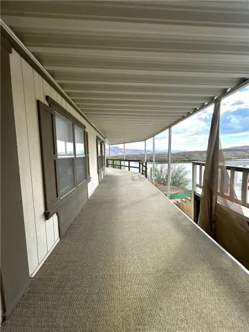 a view of a house with backyard and garden