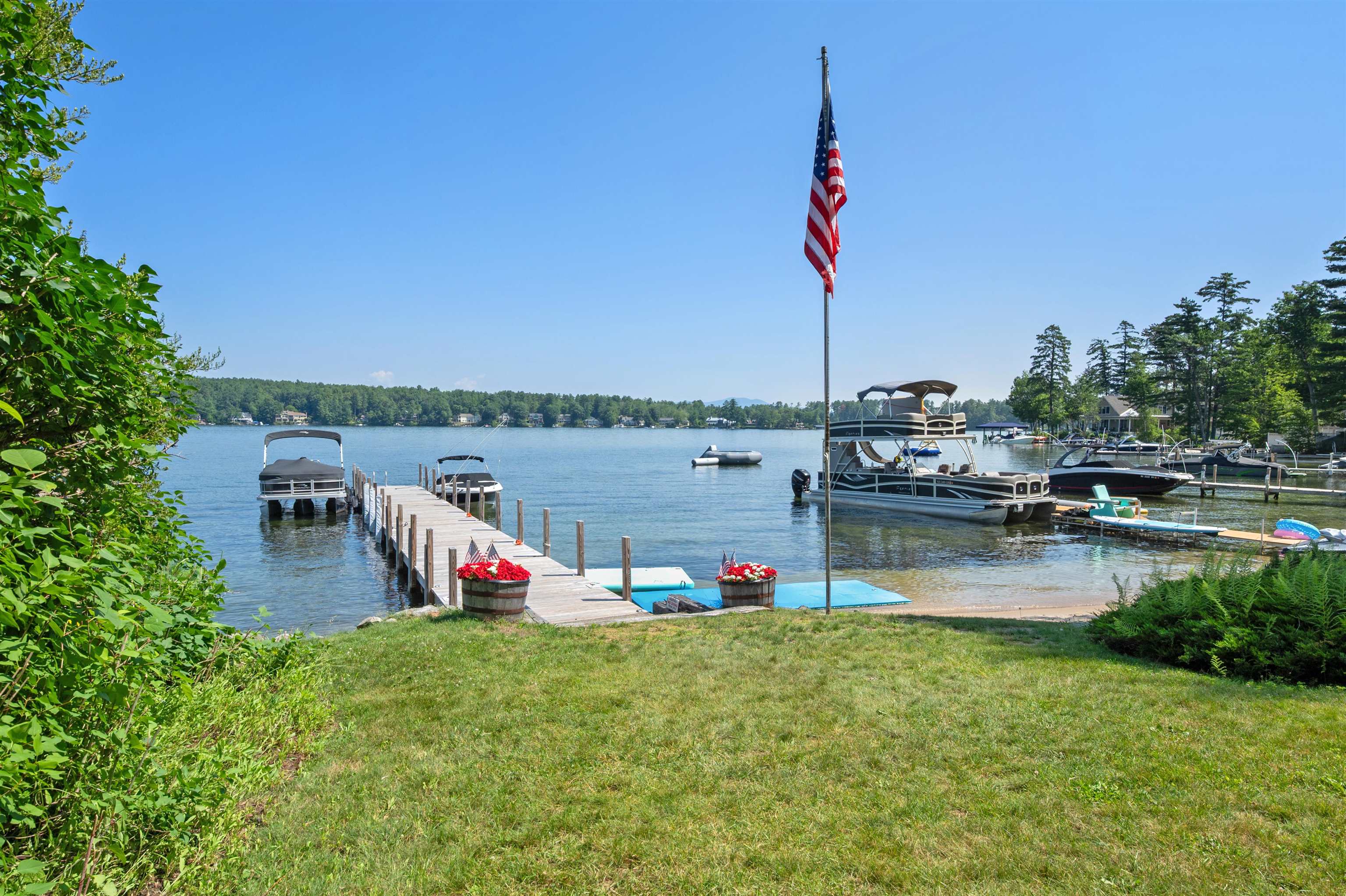 261 Dockham Shore Road, Unit D Gilford, NH 03249 - Photo 1 of 47 Gallery Image 1