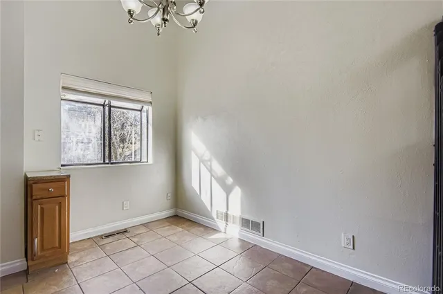 a view of a livingroom with a fireplace and stairs