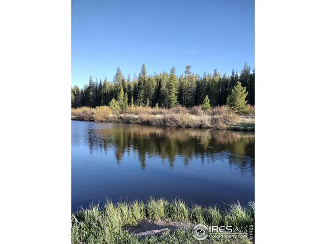 a view of a lake with a house