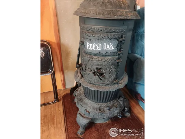 a water heater on top of a wall