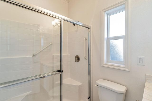 a view of cabinets and wooden floor