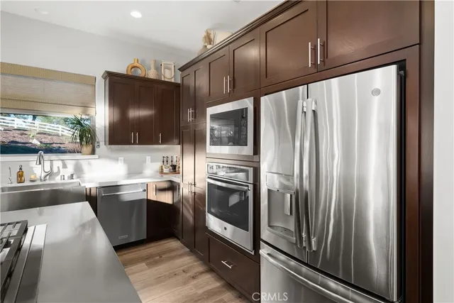 a bath tub sitting in a bathroom next to a window