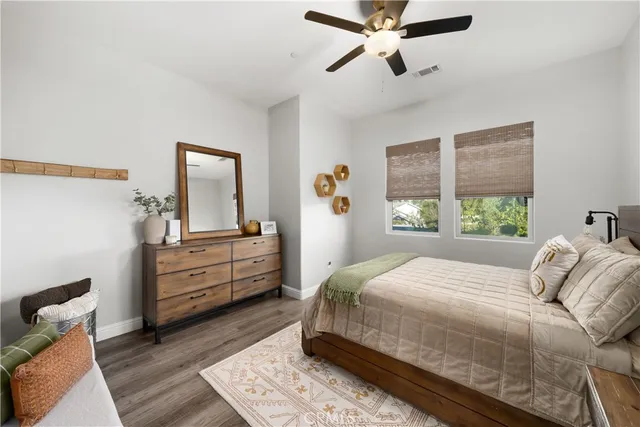 a bathroom with a shower and a sink