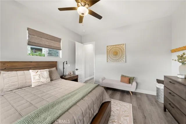 a bathroom with a granite countertop toilet and a shower