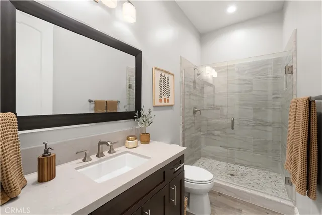 a bedroom with a bed and a desk