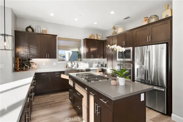 a white bath tub sitting in a bathroom next to a window