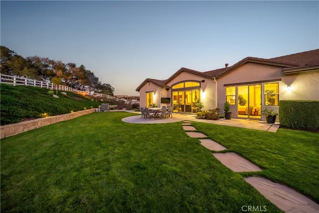 a view of a houses with a yard