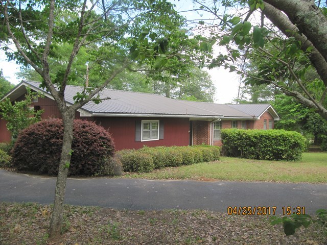 1062 Wriley Road McIntyre, GA 31054 - Photo 28 of 28 a view of a house with a tree