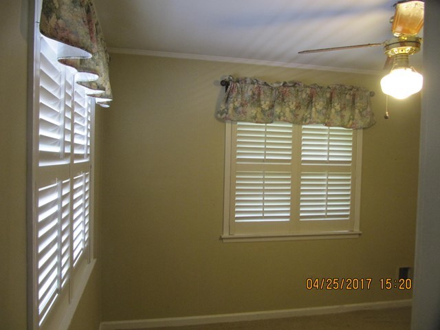 1062 Wriley Road McIntyre, GA 31054 - Photo 8 of 28 a view of a bathroom with a window and a shower