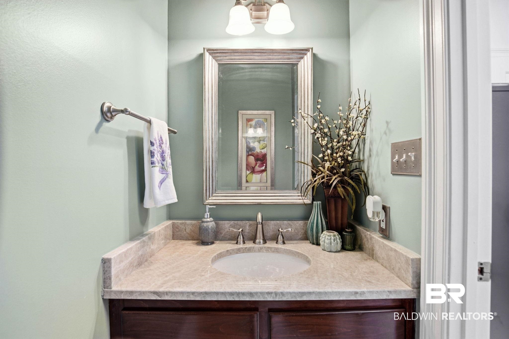 31515 Rhett Drive Spanish Fort, AL 36527 - Photo 41 of 100 The half bath off the laundry room has quartz countertop.