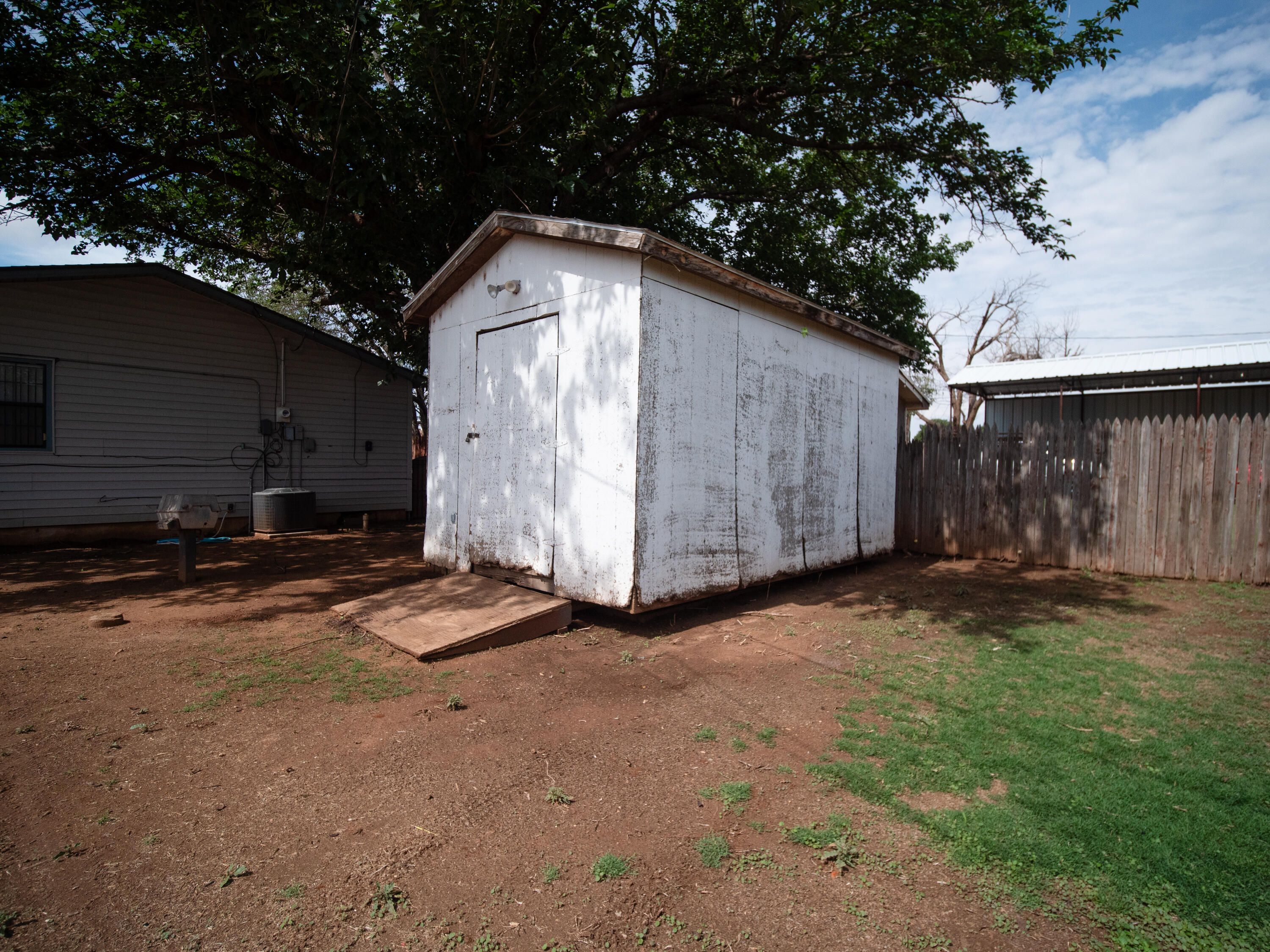 810 West 14th Street Post, TX 79356 - Photo 29 of 31 Back Yard/Storage