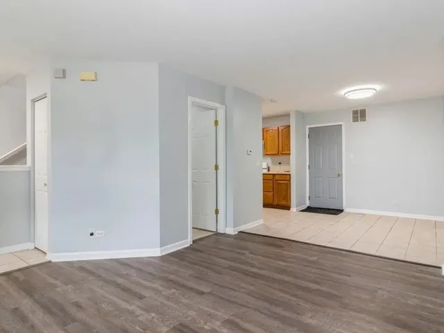 a view of a livingroom with wooden floor