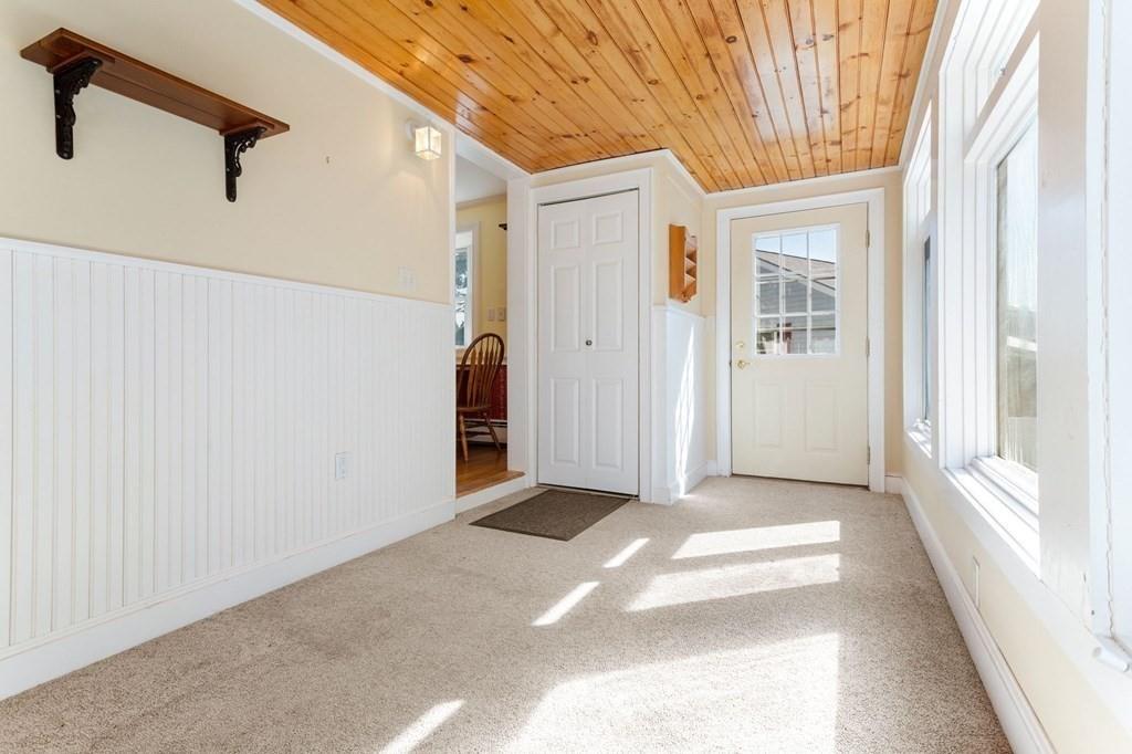 65 Moffatt Road Salem, MA 01970 - Photo 13 of 35 a view of a hallway with windows