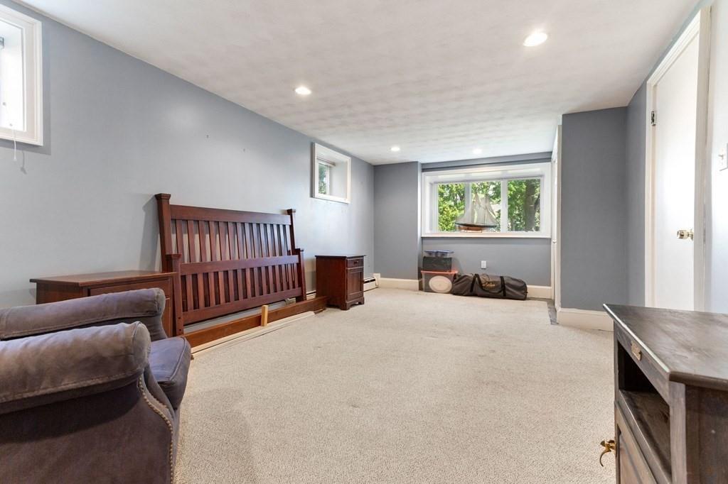 65 Moffatt Road Salem, MA 01970 - Photo 20 of 35 a bed room with furniture and a window