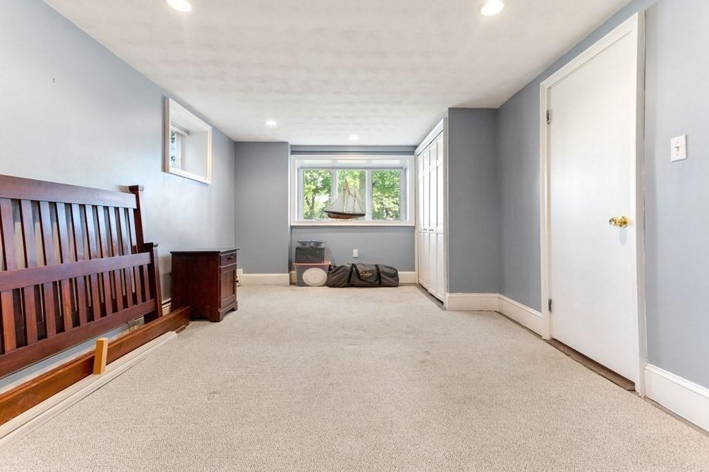 65 Moffatt Road Salem, MA 01970 - Photo 21 of 35 a bed room with furniture and a window