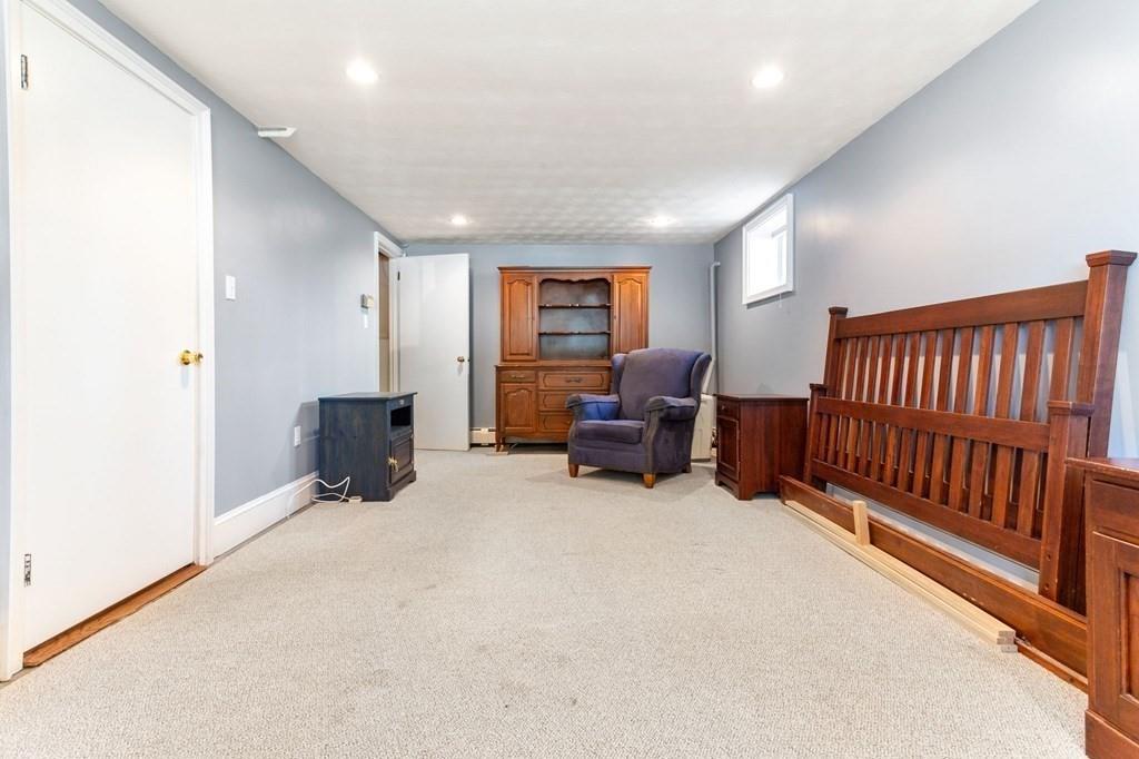 65 Moffatt Road Salem, MA 01970 - Photo 23 of 35 a view of a livingroom with furniture and workspace