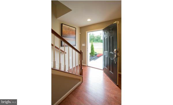 7705 Sentry Terrace Severn, MD 21144 - Photo 3 of 18 a view of a hallway with stairs