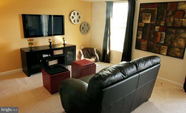 7705 Sentry Terrace Severn, MD 21144 - Photo 4 of 18 a living room with furniture