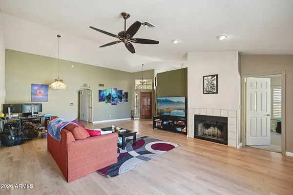 a living room with furniture and a window
